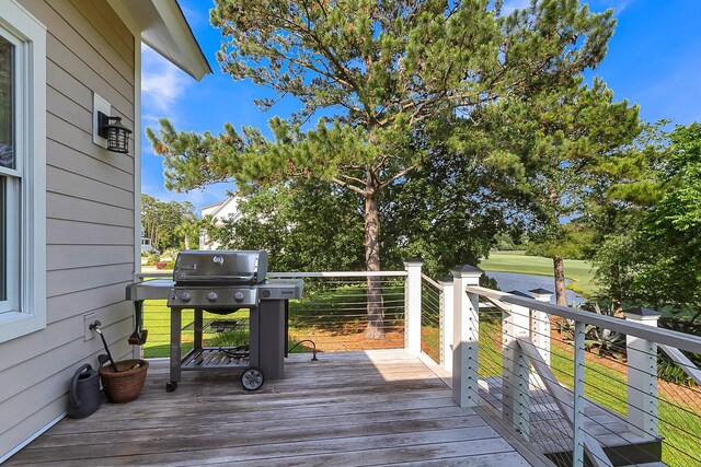 wooden deck with area for grilling