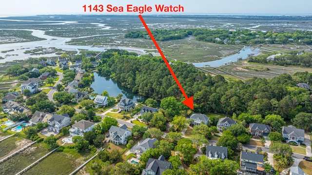 1143 Sea Eagle Watch, Charleston, SC 29412 - aerial view of property and surrounding area with a nearby body of water and nearby suburban area