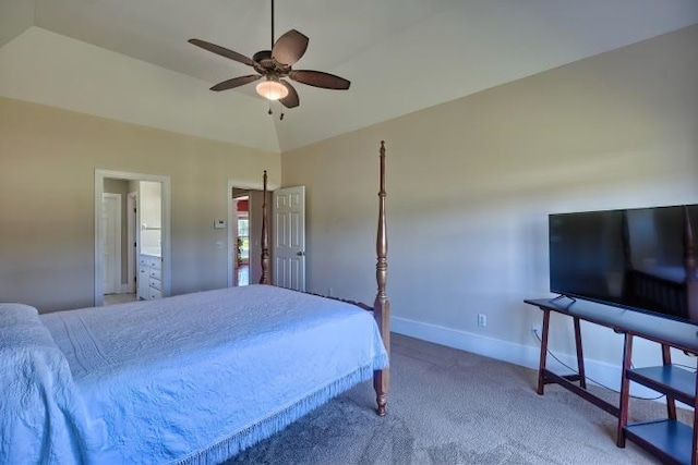 carpeted bedroom with ceiling fan and vaulted ceiling