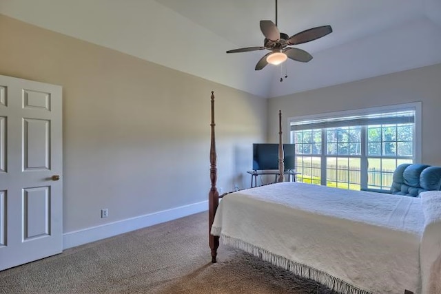 bedroom with ceiling fan, lofted ceiling, and carpet