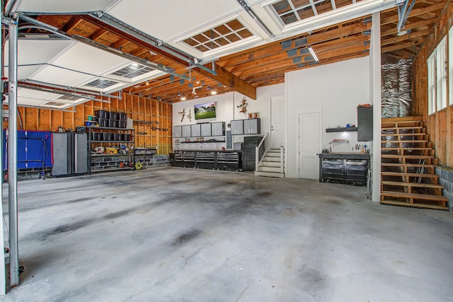 105 Bobcat Ln, Ravenel, SC 29470 - garage featuring a workshop area
