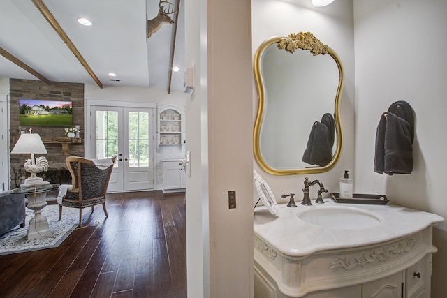 105 Bobcat Ln, Ravenel, SC 29470 - bathroom featuring wood finished floors, beamed ceiling, vanity, and recessed lighting