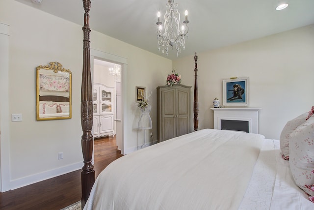 105 Bobcat Ln, Ravenel, SC 29470 - bedroom featuring dark wood-type flooring, baseboards, a chandelier, and recessed lighting