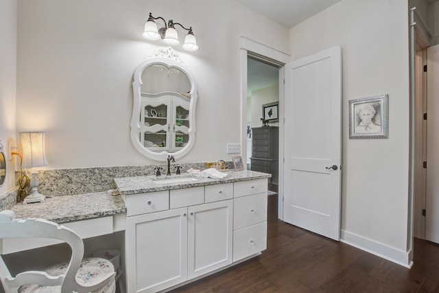 105 Bobcat Ln, Ravenel, SC 29470 - bathroom featuring wood finished floors, vanity, and baseboards