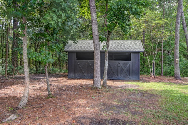 105 Bobcat Ln, Ravenel, SC 29470 - view of outdoor structure featuring a wooded view