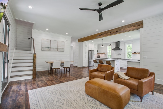 105 Bobcat Ln, Ravenel, SC 29470 - living room featuring dark wood-style flooring, ceiling fan, wood walls, recessed lighting, and stairway
