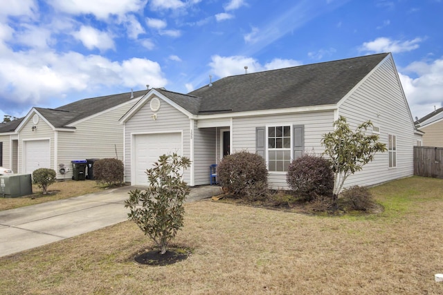 view of front of home with a garage and a front yard