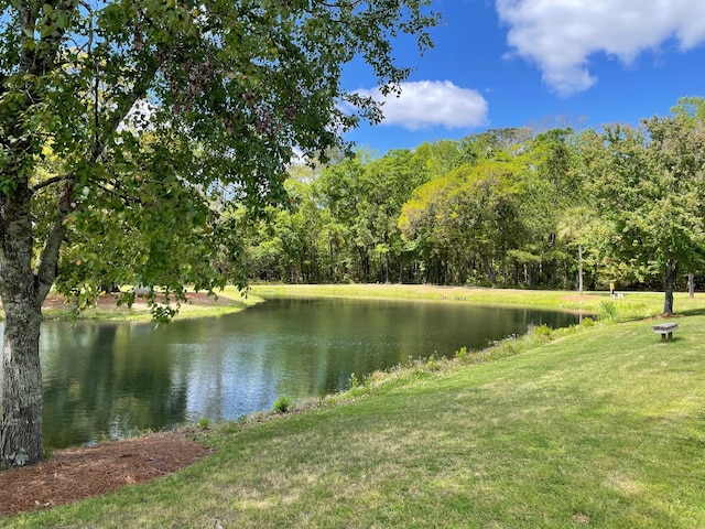view of water feature featuring a wooded view