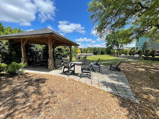 exterior space with a yard, a gazebo, and a patio