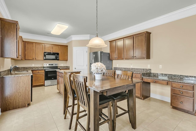 kitchen featuring light tile patterned flooring, dark stone countertops, appliances with stainless steel finishes, and crown molding