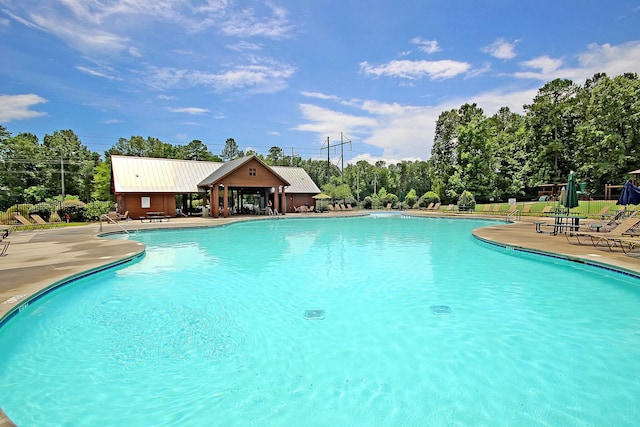 community pool featuring a patio