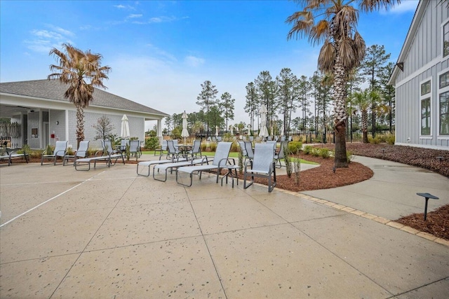 view of home's community with a patio area