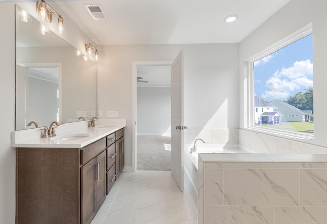 full bath with a sink, visible vents, marble finish floor, and double vanity