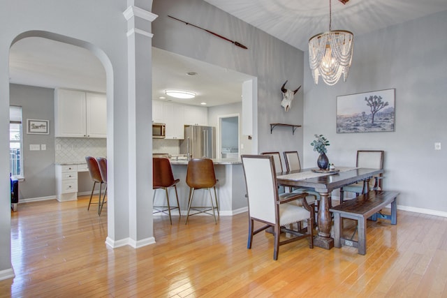 486 Maple Oak Ln, Charleston, SC 29414 - dining space featuring light wood-style flooring and baseboards