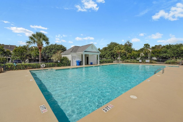 486 Maple Oak Ln, Charleston, SC 29414 - community pool with fence, a patio area, and view of scattered trees