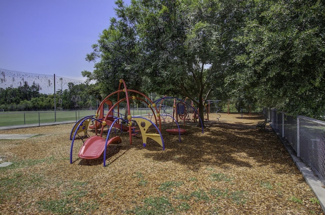486 Maple Oak Ln, Charleston, SC 29414 - community jungle gym with fence and view of wooded area