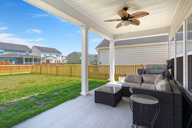 view of patio with a residential view, outdoor lounge area, and ceiling fan