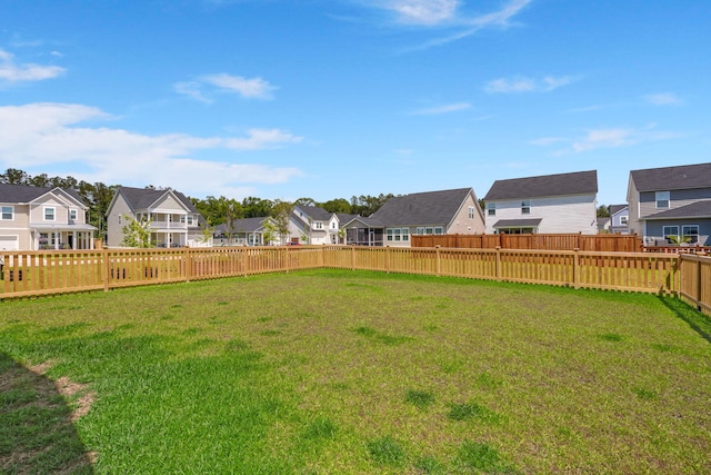 view of yard featuring a residential view