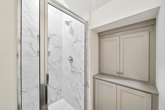 bathroom featuring an enclosed shower