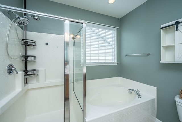 full bath featuring a shower stall, toilet, and a garden tub