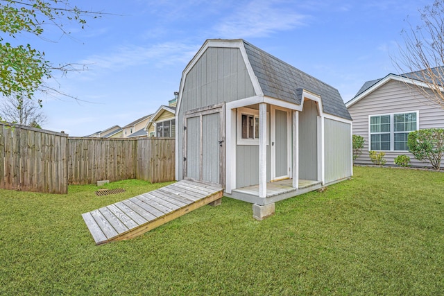 view of shed with a fenced backyard