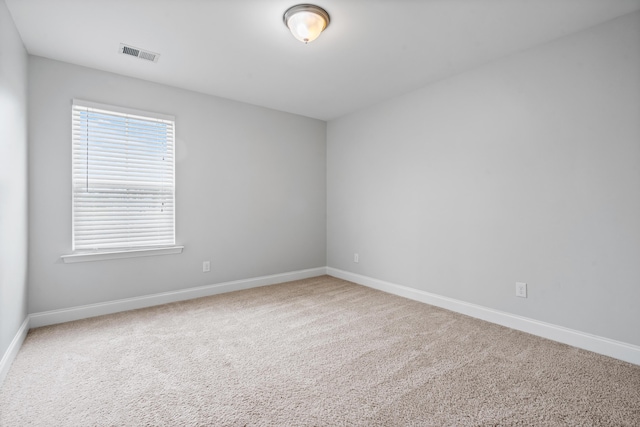 view of carpeted spare room