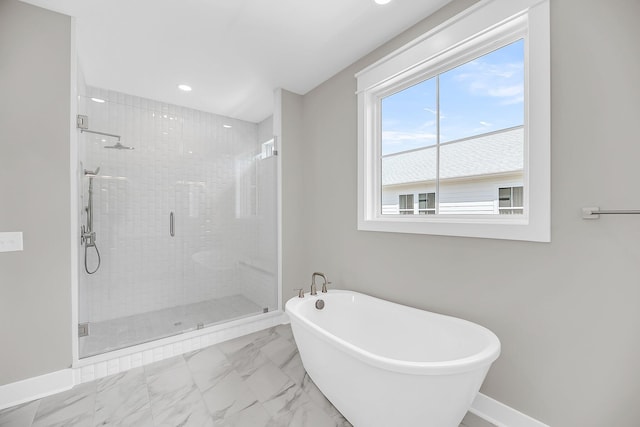 1056 Capersview Ct, Awendaw, SC 29429 - bathroom featuring a freestanding bath, marble look tiles, a shower stall, and recessed lighting