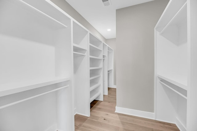1056 Capersview Ct, Awendaw, SC 29429 - walk in closet with wood finished floors