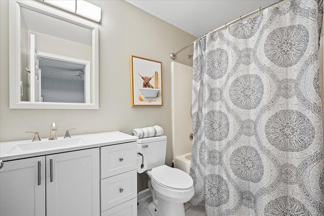 full bathroom featuring toilet, shower / bathtub combination with curtain, and vanity