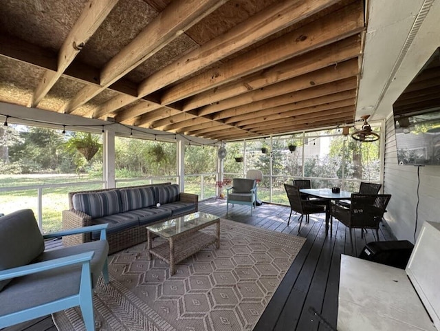 deck with outdoor dining space and an outdoor hangout area
