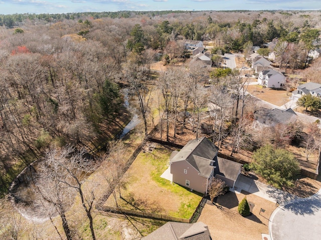 aerial view featuring a view of trees