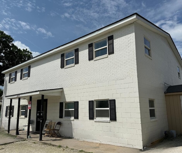 2053 Marsia Ln Unit A, B, C, D, North Charleston, SC 29405 - view of front facade with brick siding and a patio area