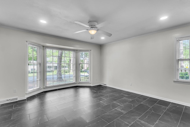 empty room featuring a ceiling fan, baseboards, recessed lighting, and ornamental molding