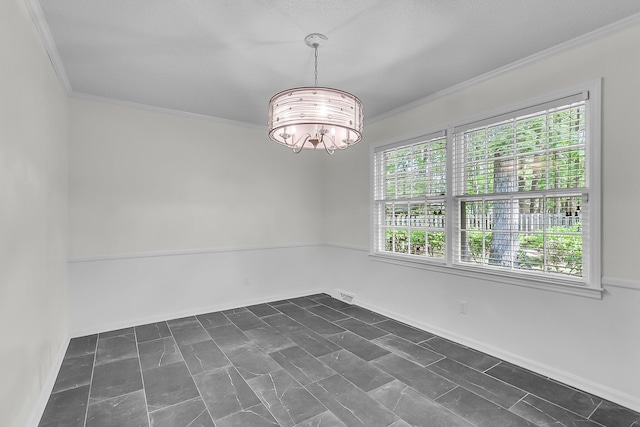 spare room with crown molding, a chandelier, and visible vents