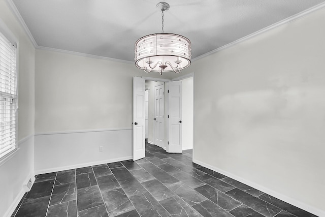 unfurnished dining area featuring ornamental molding, a notable chandelier, and a wealth of natural light