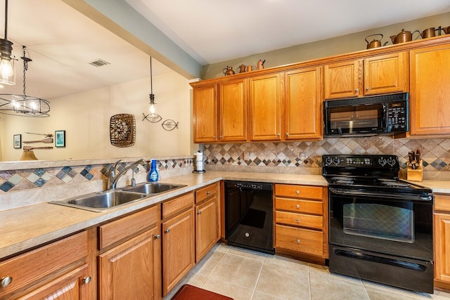202 Trillium Ct, Santee, SC 29142 - kitchen featuring black appliances, a sink, light tile patterned floors, tasteful backsplash, and light countertops