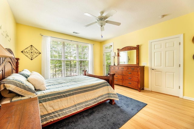 202 Trillium Ct, Santee, SC 29142 - bedroom featuring light wood-style flooring, a ceiling fan, and baseboards