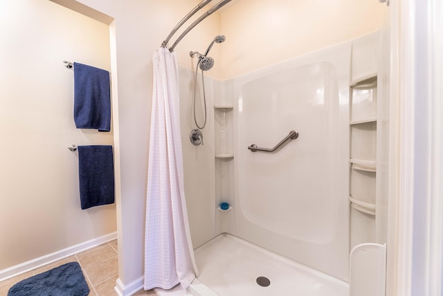 202 Trillium Ct, Santee, SC 29142 - bathroom featuring a shower stall, tile patterned flooring, and baseboards