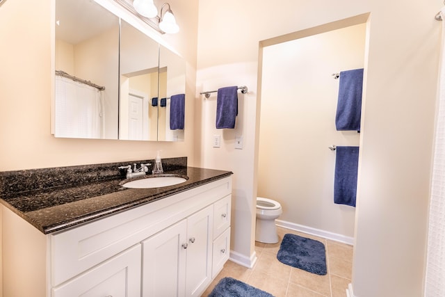 202 Trillium Ct, Santee, SC 29142 - full bathroom featuring toilet, vanity, tile patterned floors, and baseboards