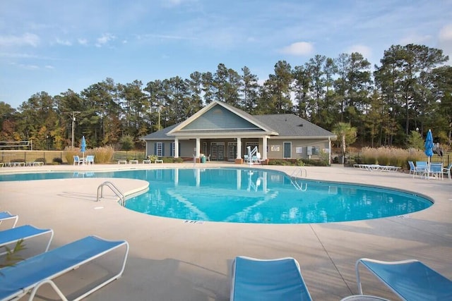 202 Trillium Ct, Santee, SC 29142 - community pool with a patio area and view of scattered trees