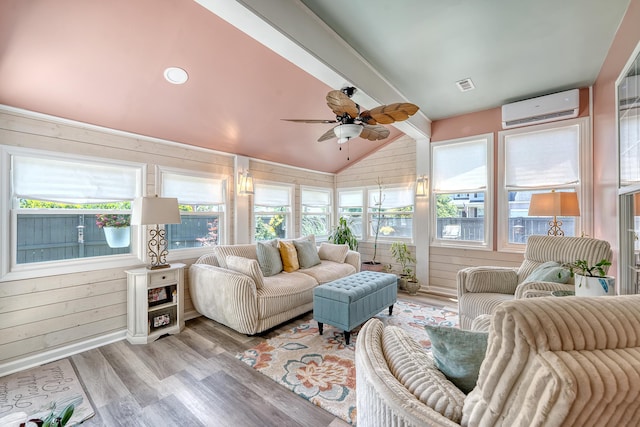 422 Cabrill Dr, Charleston, SC 29414 - sunroom featuring a wall mounted AC, an outdoor hangout area, a ceiling fan, plenty of natural light, and wood walls