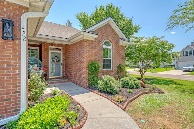 422 Cabrill Dr, Charleston, SC 29414 - entrance to property with brick siding, a lawn, a chimney, and a shingled roof