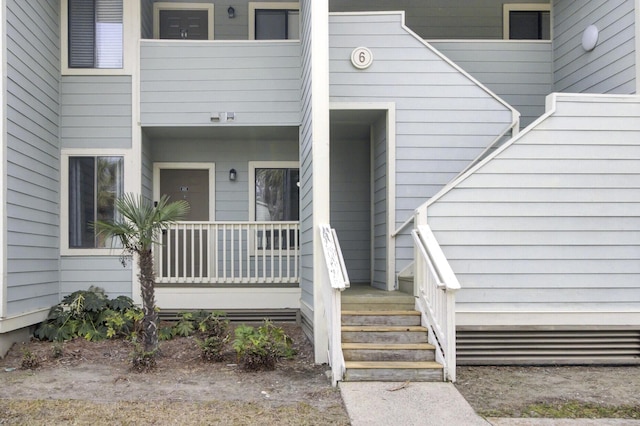 doorway to property with a porch