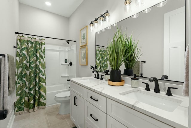 bathroom with toilet, tile patterned flooring, a sink, and shower / tub combo with curtain