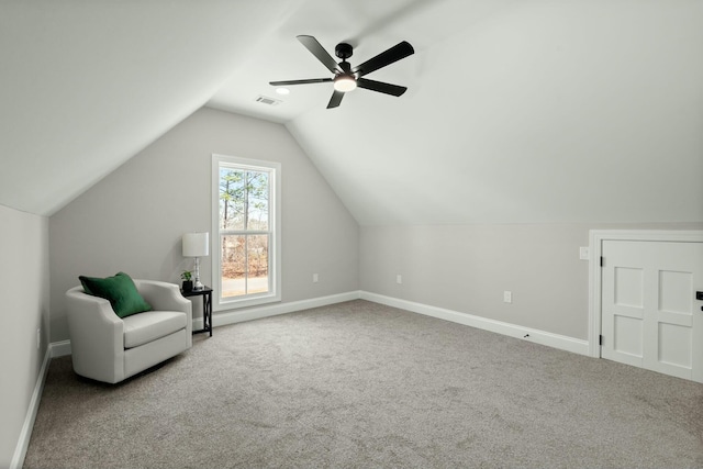 unfurnished room with visible vents, light carpet, and baseboards