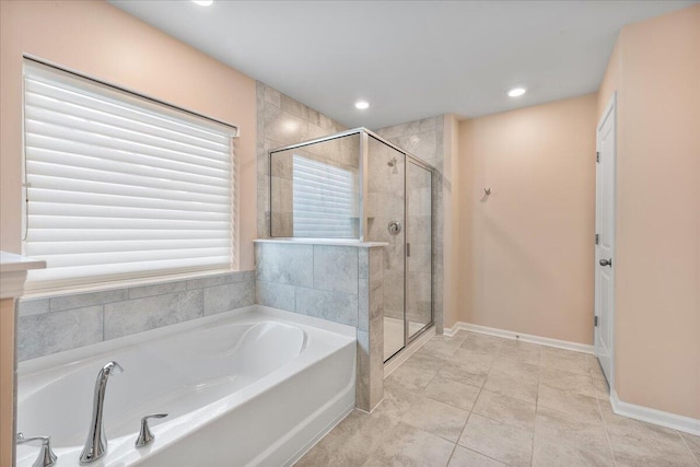 bathroom featuring tile patterned floors and plus walk in shower