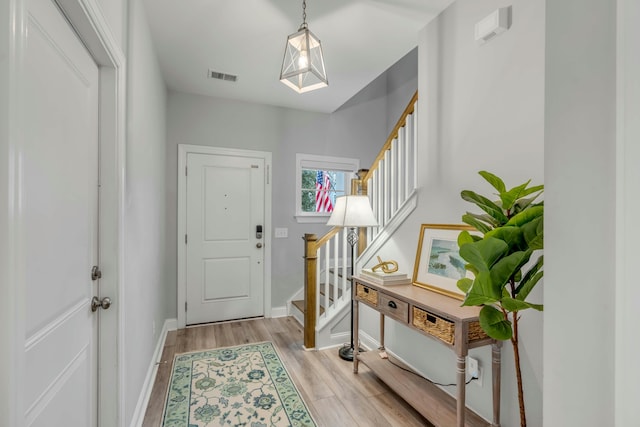 entrance foyer featuring light wood-type flooring