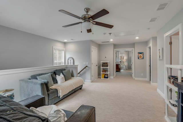 living room featuring light carpet