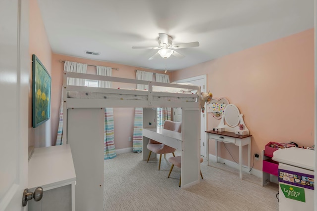 carpeted bedroom featuring ceiling fan