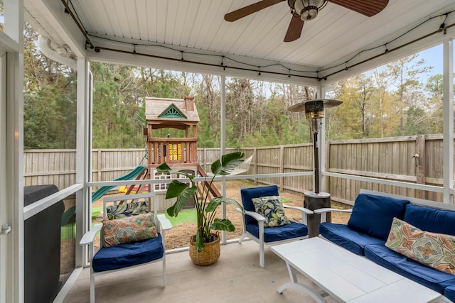 sunroom / solarium with ceiling fan